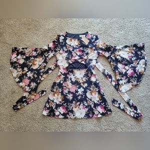Floral Mid Dress, Front Cutout and flowing sleeves.